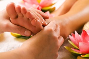 Reflexology is a a system of massage used to relieve tension and treat illness, based on the theory that there are reflex points on the feet, hands and head that are linked to every part of the body.